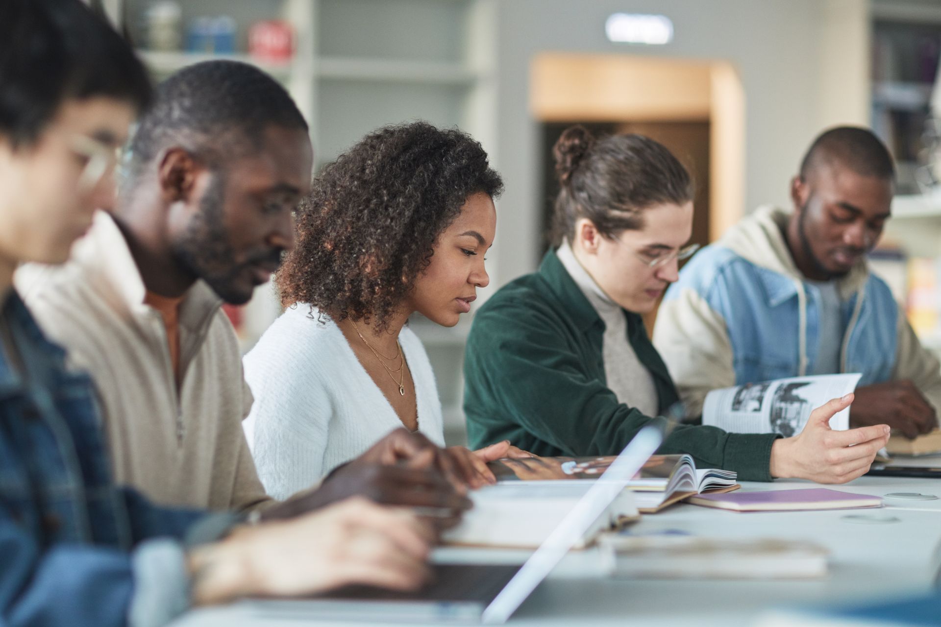 CNAM banner - diverse students study table